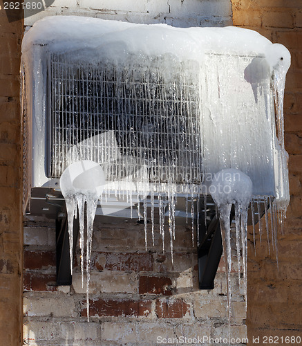 Image of Frozen air conditioning with icicle