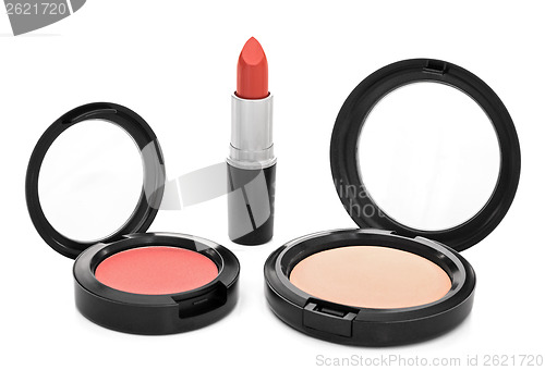 Image of Lipstick, blush and face powder on white background