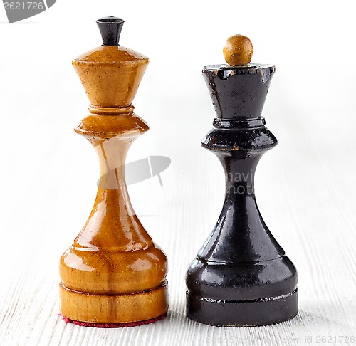 Image of Two old wooden chess pieces