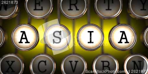 Image of Old Typewriter's Keys with Asia Slogan.