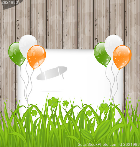 Image of Greeting card with grass and balloons in Irish flag color for St