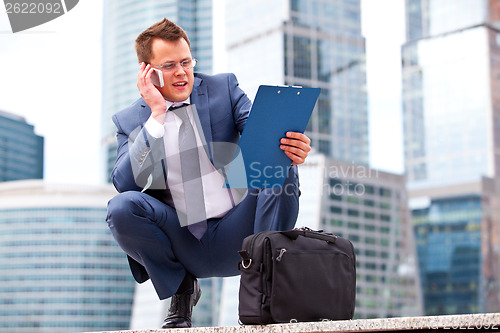 Image of businessman talking on the phone