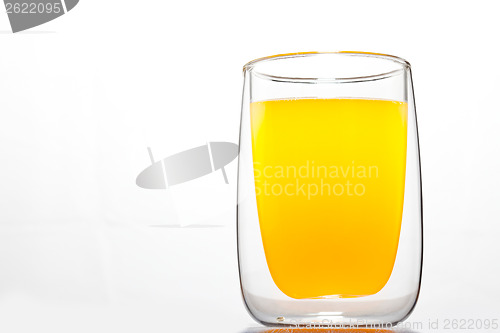 Image of glass with orange drink