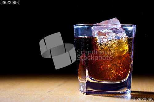 Image of glass with red drink