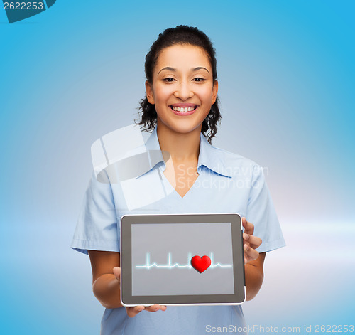 Image of smiling female doctor or nurse with tablet pc