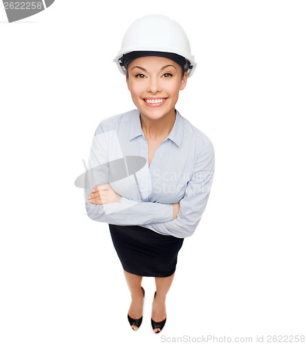 Image of businesswoman in white helmet