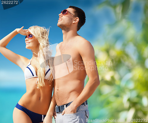 Image of beautiful couple on the beach