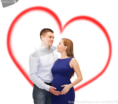 Image of happy young family expecting child