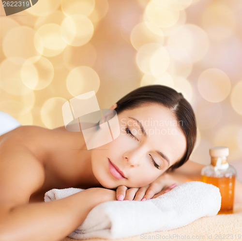 Image of happy woman in spa salon