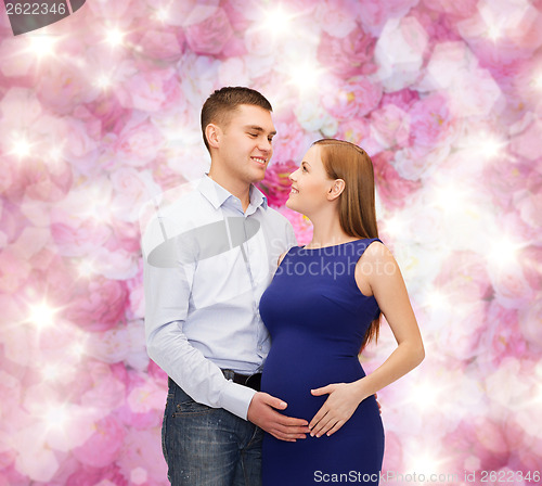 Image of happy young family expecting child