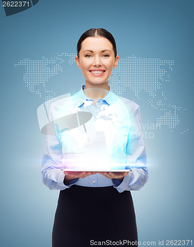 Image of smiling businesswoman with blank tablet screen