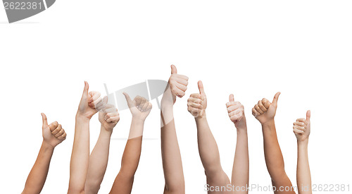 Image of human hands showing thumbs up