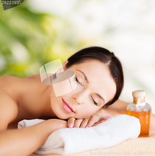 Image of happy woman in spa salon