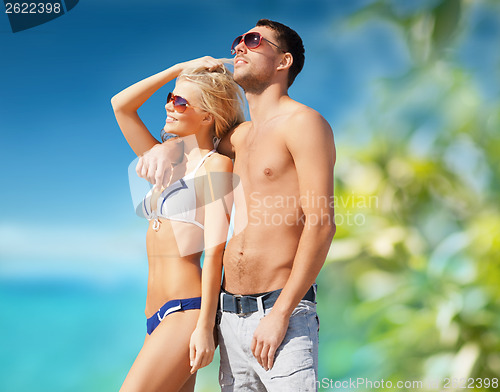 Image of beautiful couple on the beach