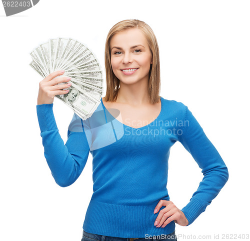 Image of smiling girl with dollar cash money