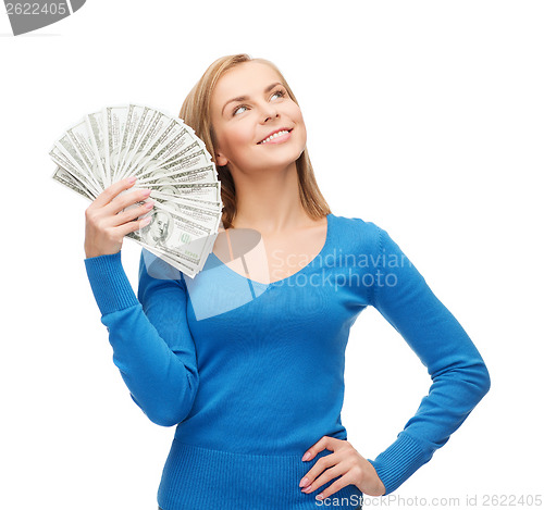 Image of smiling girl with dollar cash money