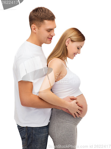 Image of happy young family expecting child