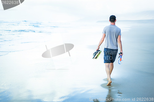 Image of young man walking