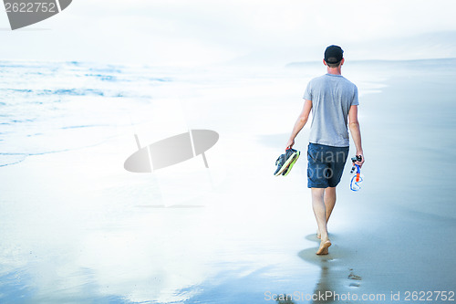 Image of young man walking