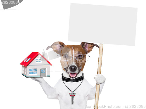 Image of banner dog home and key