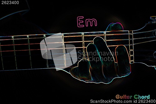 Image of Guitar chord on a dark background