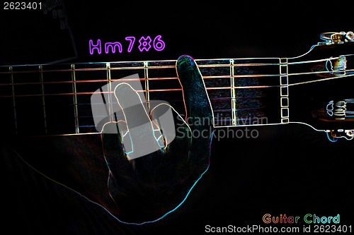 Image of Guitar chord on a dark background