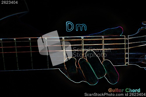Image of Guitar chord on a dark background