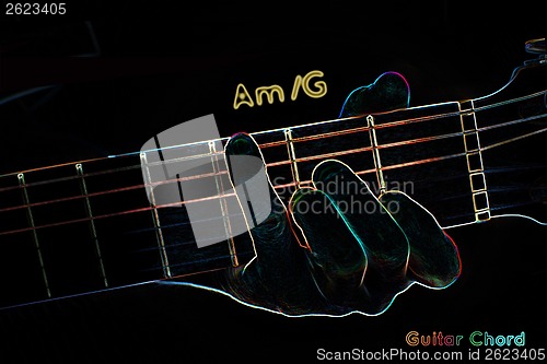 Image of Guitar chord on a dark background