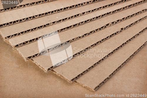 Image of Stack of clean new blades of cardboard