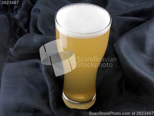 Image of Frosty glass of light beer set