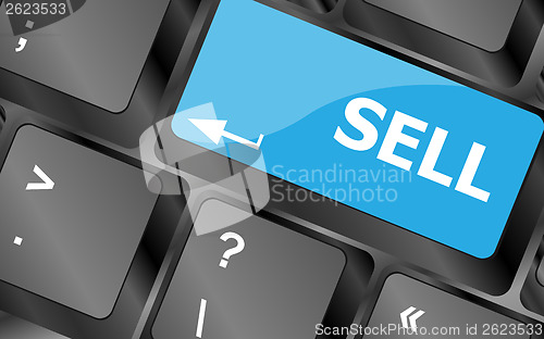 Image of sell written on keyboard keys showing business or finance concept