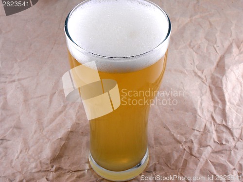 Image of Frosty glass of light beer set