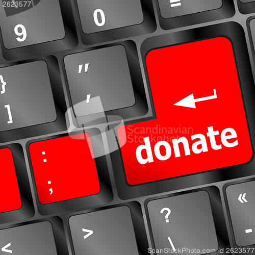 Image of donate button on computer keyboard pc key