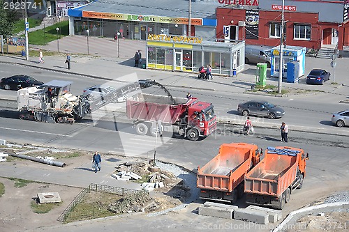 Image of Roadwork. Removal of old asphalt by means of special equipment.