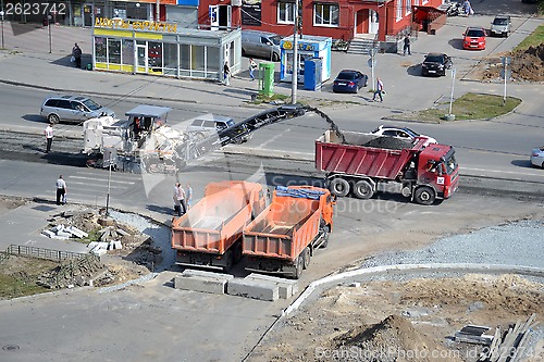 Image of Roadwork. Removal of old asphalt by means of special equipment.