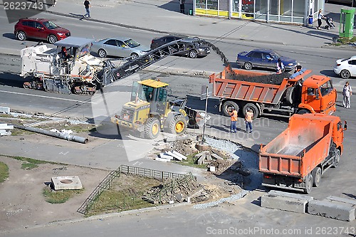 Image of Roadwork. Removal of old asphalt by means of special equipment.