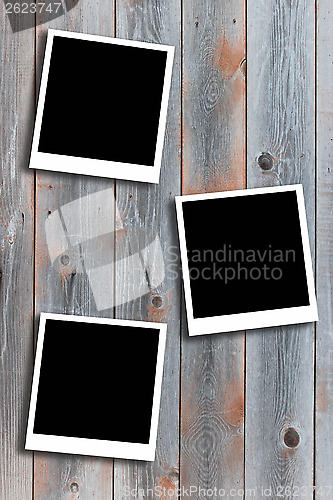 Image of three photos on the background of boards