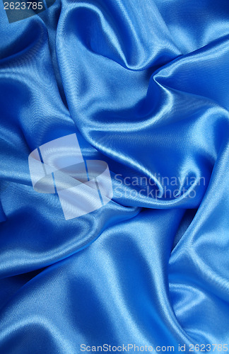 Image of Smooth elegant blue silk as background 