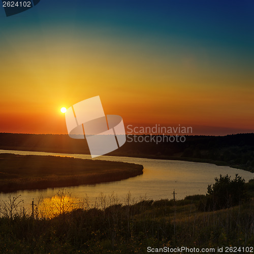 Image of sunset over river