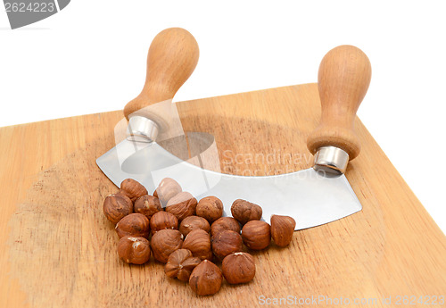 Image of Whole hazelnuts with a rocking knife
