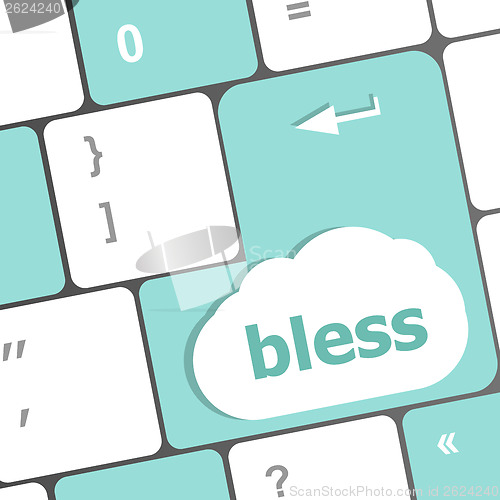 Image of bless text on computer keyboard key - business concept