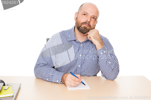 Image of bearded thinking man
