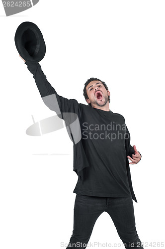 Image of Young man with hat in hand yelling