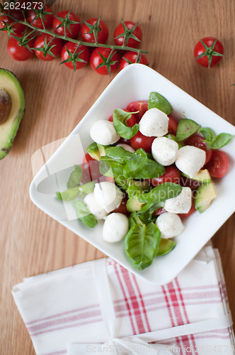 Image of Salad from tomatoes, mozzarella, basil