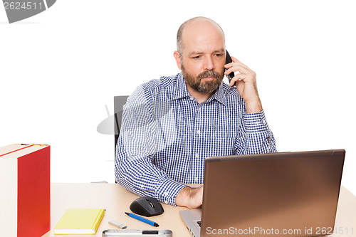 Image of business man at the phone