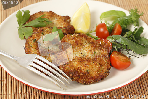 Image of Homemade breaded fishcakes with a salad