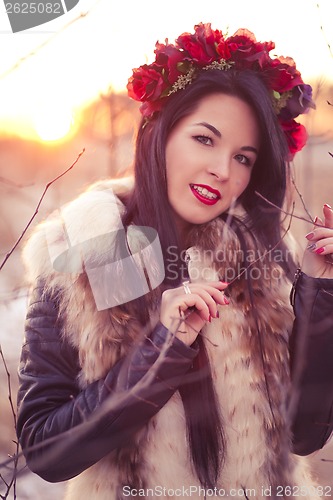 Image of Winter girl with flowers