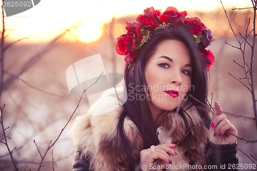 Image of Winter girl with flowers
