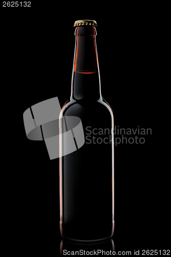 Image of Beer bottle isolated on black