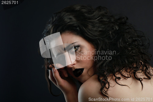 Image of Depressed Sad Thinking Woman on Black Background